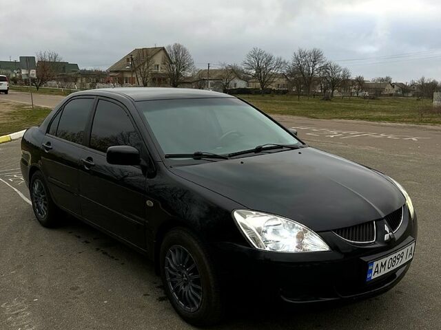 Чорний Міцубісі Lancer, об'ємом двигуна 1.6 л та пробігом 380 тис. км за 4350 $, фото 1 на Automoto.ua