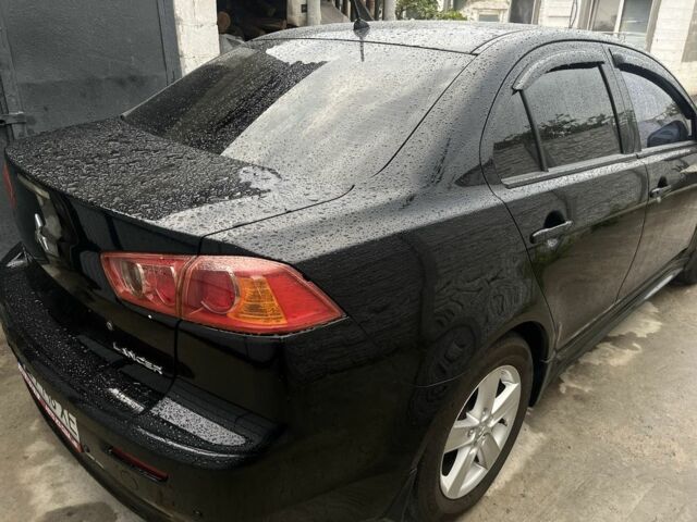 Чорний Міцубісі Lancer, об'ємом двигуна 2 л та пробігом 219 тис. км за 6800 $, фото 4 на Automoto.ua