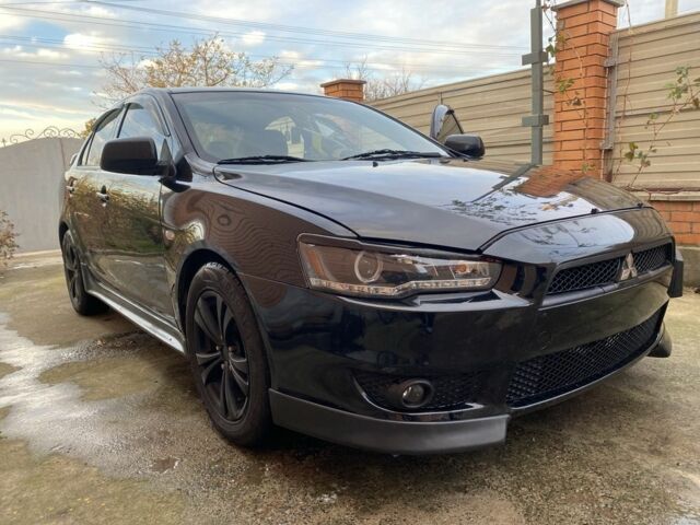 Черный Мицубиси Лансер, объемом двигателя 2 л и пробегом 140 тыс. км за 7200 $, фото 6 на Automoto.ua