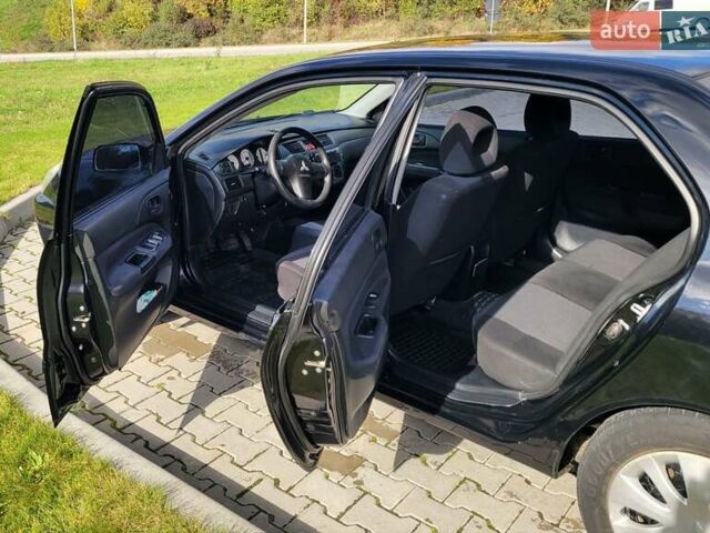Міцубісі Lancer 2008 у Тернополі на Automoto.ua Чорний Міцубісі Lancer, об'ємом двигуна 1.58 л та пробігом 182 тис. км за 5600 $, фото 13 на Automoto.ua