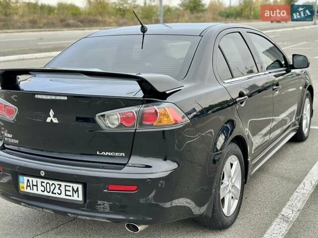 Чорний Міцубісі Lancer, об'ємом двигуна 2 л та пробігом 199 тис. км за 7900 $, фото 6 на Automoto.ua