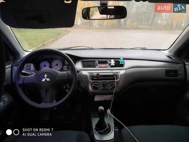 Мицубиси Лансер 2008 в Прилуках на Automoto.ua Черный Мицубиси Лансер, объемом двигателя 1.58 л и пробегом 219 тыс. км за 4900 $, фото 10 на Automoto.ua