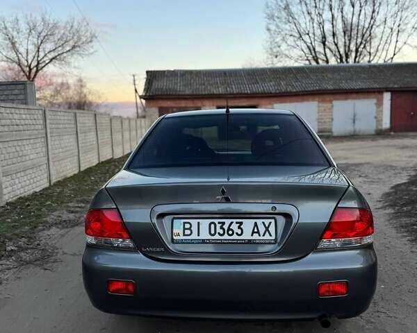 Черный Мицубиси Лансер, объемом двигателя 1.6 л и пробегом 225 тыс. км за 3400 $, фото 8 на Automoto.ua