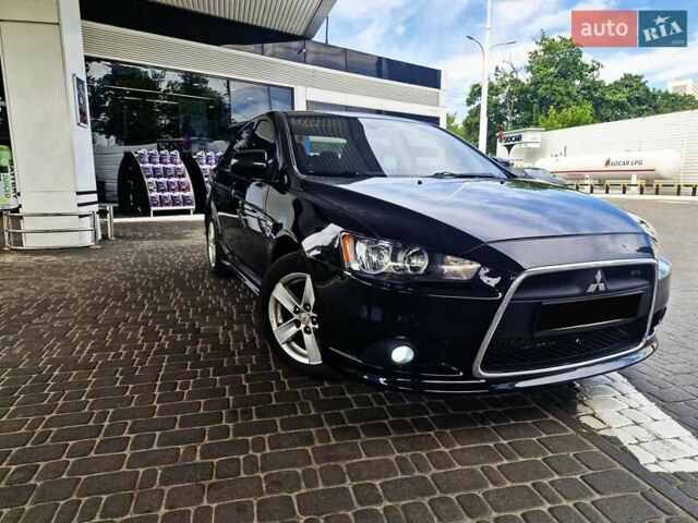 Чорний Міцубісі Lancer, об'ємом двигуна 2 л та пробігом 240 тис. км за 7850 $, фото 18 на Automoto.ua
