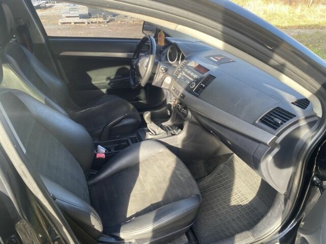 Черный Мицубиси Лансер, объемом двигателя 2 л и пробегом 190 тыс. км за 3100 $, фото 6 на Automoto.ua