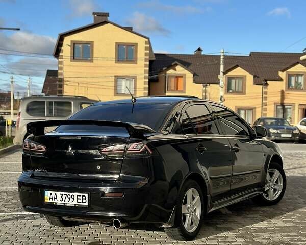 Черный Мицубиси Лансер, объемом двигателя 2 л и пробегом 150 тыс. км за 7850 $, фото 25 на Automoto.ua