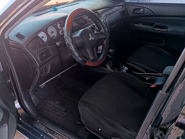 Чорний Міцубісі Lancer, об'ємом двигуна 1.6 л та пробігом 0 тис. км за 4200 $, фото 6 на Automoto.ua