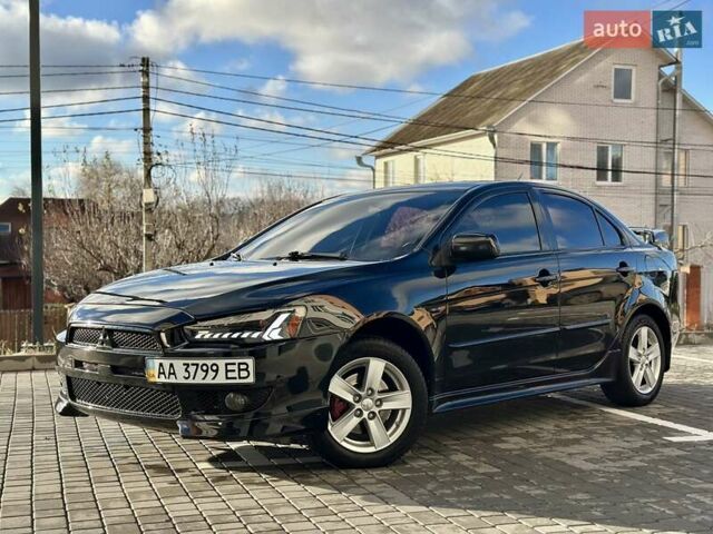 Черный Мицубиси Лансер, объемом двигателя 2 л и пробегом 150 тыс. км за 7850 $, фото 17 на Automoto.ua