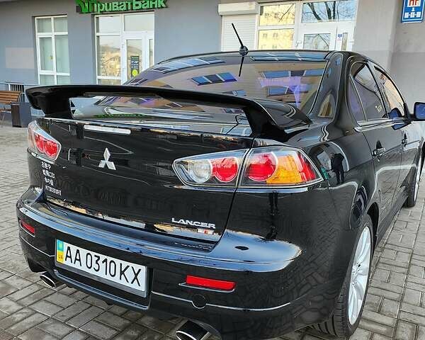 Чорний Міцубісі Lancer, об'ємом двигуна 2 л та пробігом 150 тис. км за 10500 $, фото 11 на Automoto.ua