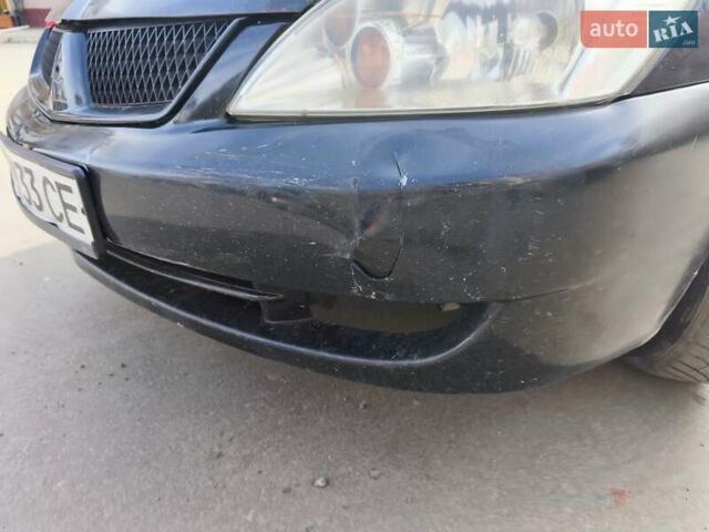 Черный Мицубиси Лансер, объемом двигателя 1.6 л и пробегом 358 тыс. км за 4300 $, фото 10 на Automoto.ua