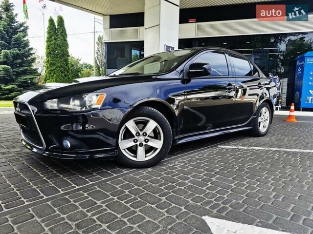 Чорний Міцубісі Lancer, об'ємом двигуна 2 л та пробігом 240 тис. км за 7850 $, фото 13 на Automoto.ua