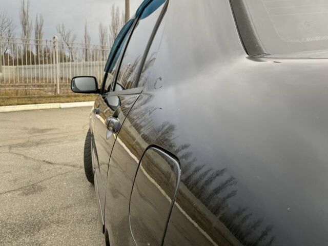 Черный Мицубиси Лансер, объемом двигателя 1.6 л и пробегом 350 тыс. км за 4500 $, фото 6 на Automoto.ua