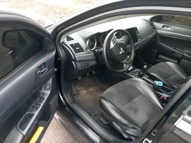 Чорний Міцубісі Lancer, об'ємом двигуна 2 л та пробігом 232 тис. км за 5000 $, фото 1 на Automoto.ua