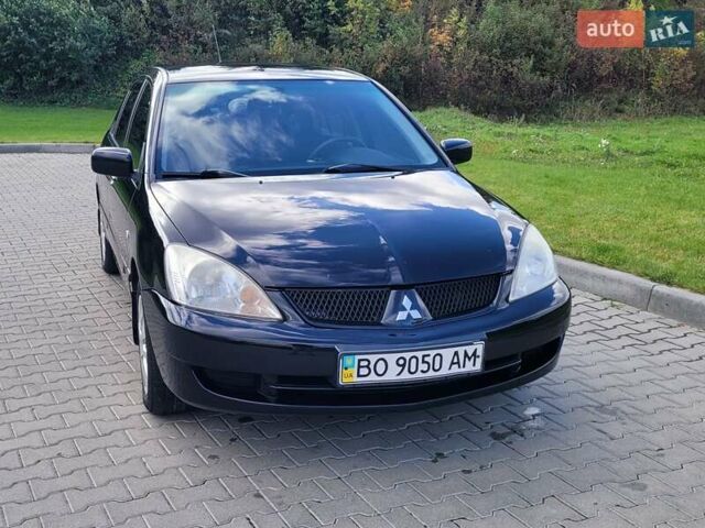 Міцубісі Lancer 2008 у Тернополі на Automoto.ua Чорний Міцубісі Lancer, об'ємом двигуна 1.58 л та пробігом 182 тис. км за 5600 $, фото 9 на Automoto.ua