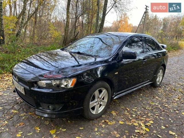 Чорний Міцубісі Lancer, об'ємом двигуна 2 л та пробігом 237 тис. км за 7500 $, фото 10 на Automoto.ua