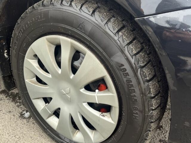 Черный Мицубиси Лансер, объемом двигателя 1.6 л и пробегом 1 тыс. км за 3750 $, фото 6 на Automoto.ua