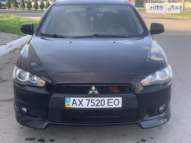 Чорний Міцубісі Lancer, об'ємом двигуна 2 л та пробігом 170 тис. км за 7249 $, фото 7 на Automoto.ua