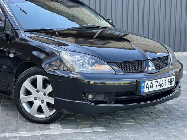 Міцубісі Lancer 2008 у Синельниковом на Automoto.ua Чорний Міцубісі Lancer, об'ємом двигуна 1.6 л та пробігом 230 тис. км за 4500 $, фото 2 на Automoto.ua