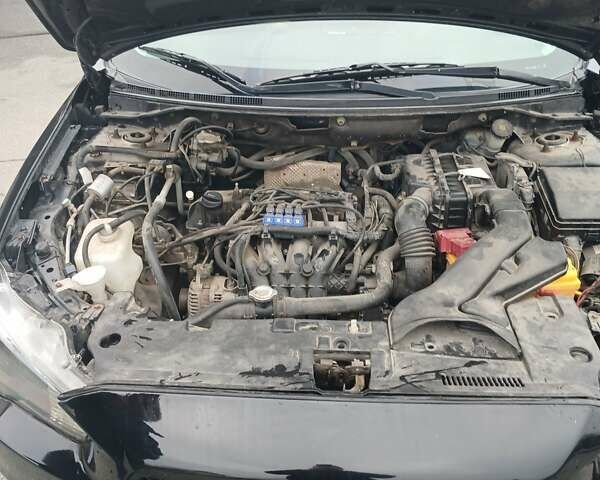 Черный Мицубиси Лансер, объемом двигателя 1.5 л и пробегом 253 тыс. км за 5500 $, фото 5 на Automoto.ua