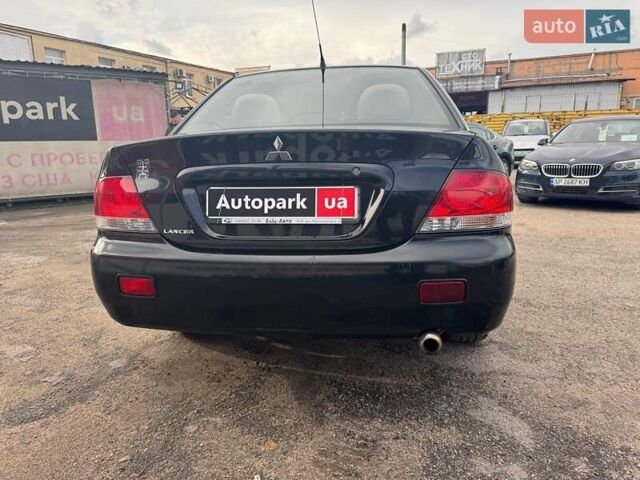 Мицубиси Лансер 2008 в Запорожье на Automoto.ua Черный Мицубиси Лансер, объемом двигателя 1.6 л и пробегом 316 тыс. км за 4290 $, фото 1 на Automoto.ua