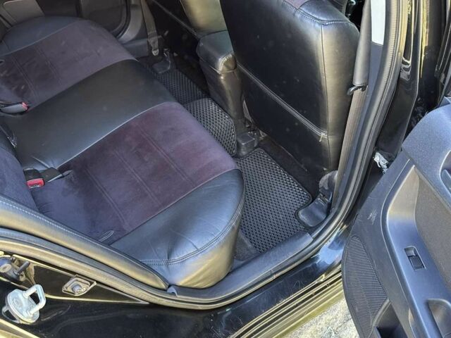 Чорний Міцубісі Lancer, об'ємом двигуна 2 л та пробігом 230 тис. км за 6650 $, фото 9 на Automoto.ua