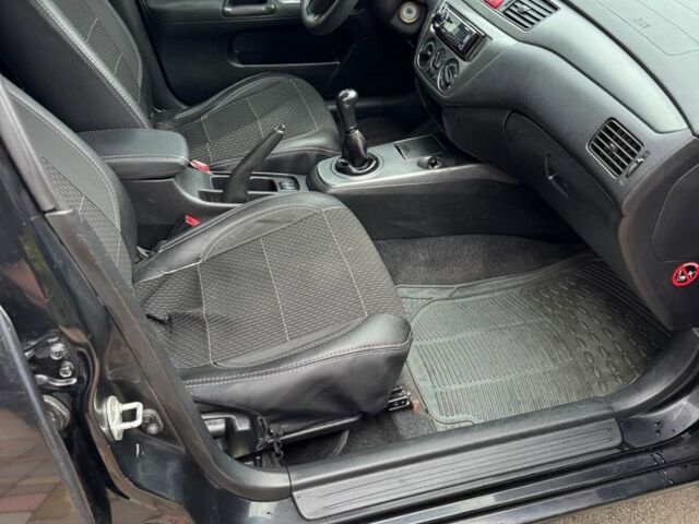 Чорний Міцубісі Lancer, об'ємом двигуна 1.6 л та пробігом 220 тис. км за 3600 $, фото 9 на Automoto.ua