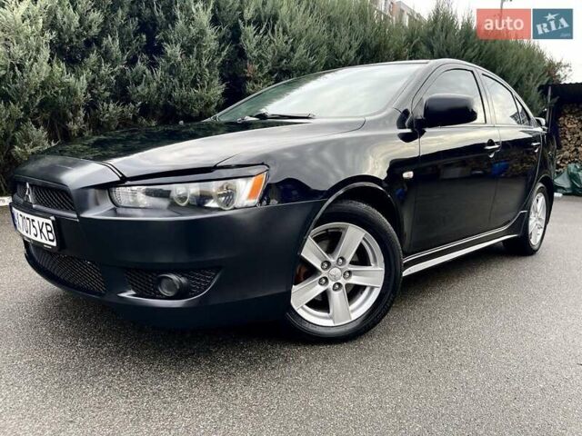 Чорний Міцубісі Lancer, об'ємом двигуна 2 л та пробігом 217 тис. км за 5800 $, фото 1 на Automoto.ua