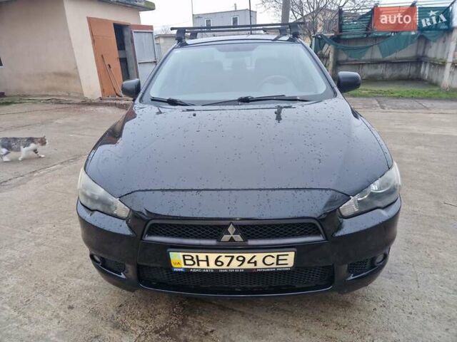 Чорний Міцубісі Lancer, об'ємом двигуна 2 л та пробігом 300 тис. км за 6000 $, фото 3 на Automoto.ua