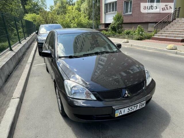 Чорний Міцубісі Lancer, об'ємом двигуна 1.6 л та пробігом 78 тис. км за 3999 $, фото 5 на Automoto.ua