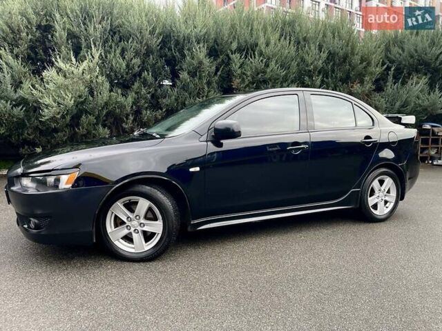 Чорний Міцубісі Lancer, об'ємом двигуна 2 л та пробігом 217 тис. км за 5600 $, фото 10 на Automoto.ua