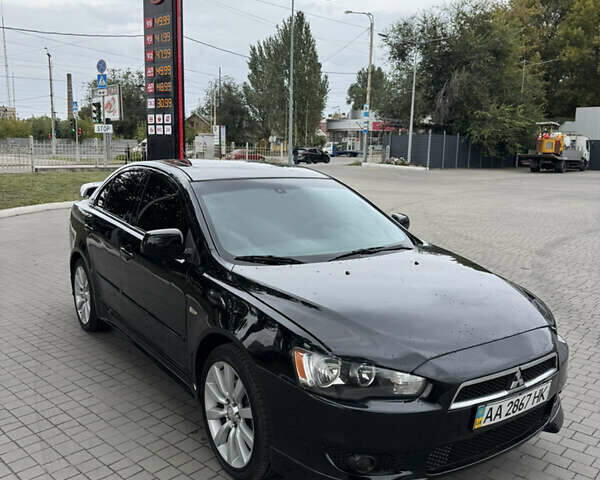 Чорний Міцубісі Lancer, об'ємом двигуна 2 л та пробігом 200 тис. км за 6800 $, фото 1 на Automoto.ua