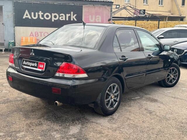 Мицубиси Лансер 2008 в Запорожье на Automoto.ua Черный Мицубиси Лансер, объемом двигателя 1.6 л и пробегом 316 тыс. км за 4290 $, фото 6 на Automoto.ua