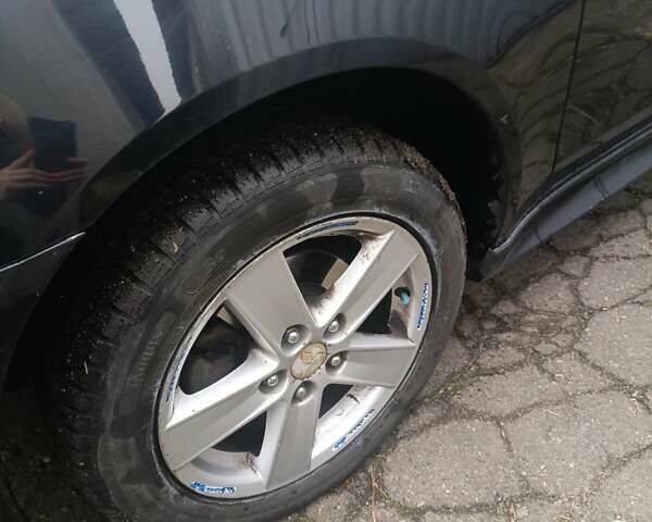 Черный Мицубиси Лансер, объемом двигателя 2 л и пробегом 192 тыс. км за 6350 $, фото 5 на Automoto.ua