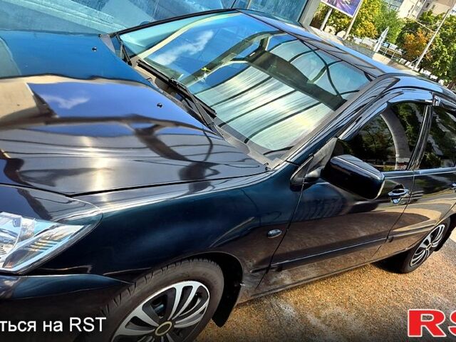 Черный Мицубиси Лансер, объемом двигателя 1.6 л и пробегом 205 тыс. км за 5500 $, фото 2 на Automoto.ua