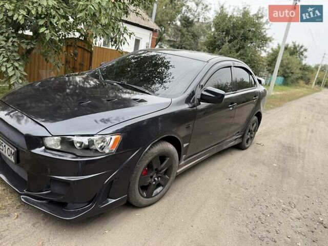 Чорний Міцубісі Lancer, об'ємом двигуна 1.5 л та пробігом 270 тис. км за 8000 $, фото 1 на Automoto.ua