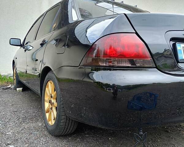Мицубиси Лансер 2008 в Львове на Automoto.ua Черный Мицубиси Лансер, объемом двигателя 1.58 л и пробегом 200 тыс. км за 5200 $, фото 120 на Automoto.ua