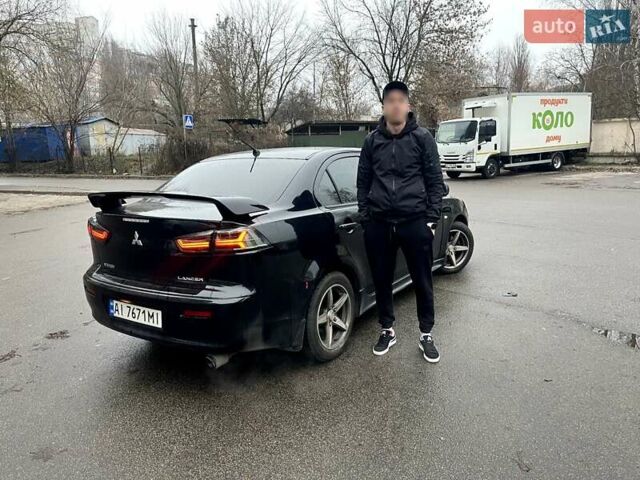 Черный Мицубиси Лансер, объемом двигателя 2 л и пробегом 217 тыс. км за 7000 $, фото 36 на Automoto.ua