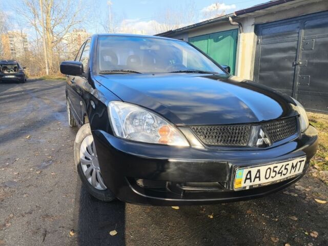 Черный Мицубиси Лансер, объемом двигателя 1.6 л и пробегом 243 тыс. км за 3200 $, фото 7 на Automoto.ua
