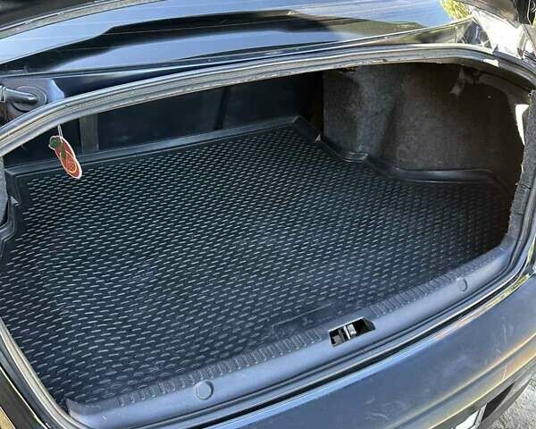 Черный Мицубиси Лансер, объемом двигателя 2 л и пробегом 230 тыс. км за 7000 $, фото 25 на Automoto.ua