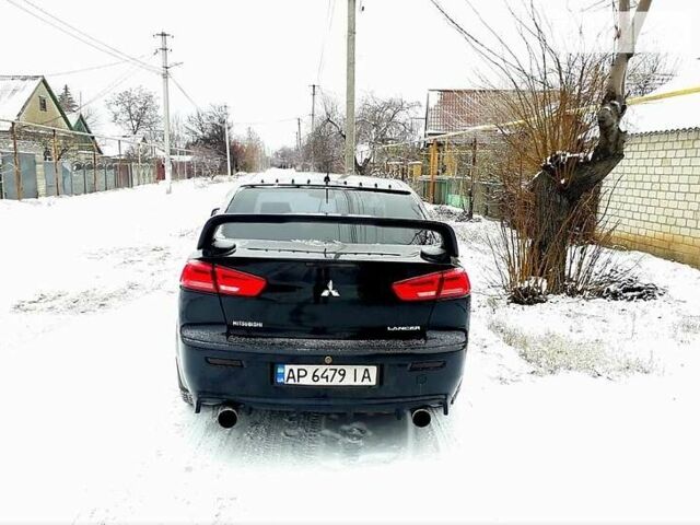 Чорний Міцубісі Lancer, об'ємом двигуна 2 л та пробігом 208 тис. км за 9500 $, фото 2 на Automoto.ua