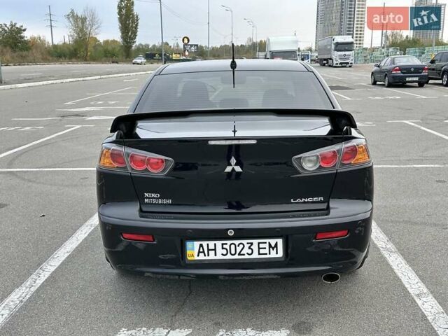 Чорний Міцубісі Lancer, об'ємом двигуна 2 л та пробігом 199 тис. км за 7900 $, фото 9 на Automoto.ua