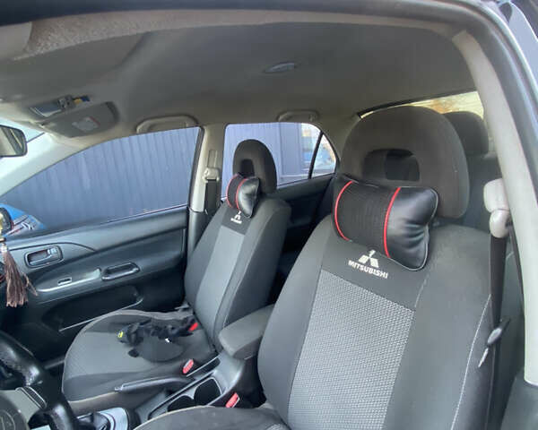 Мицубиси Лансер 2008 в Киеве на Automoto.ua Черный Мицубиси Лансер, объемом двигателя 1.6 л и пробегом 72 тыс. км за 2650 $, фото 11 на Automoto.ua