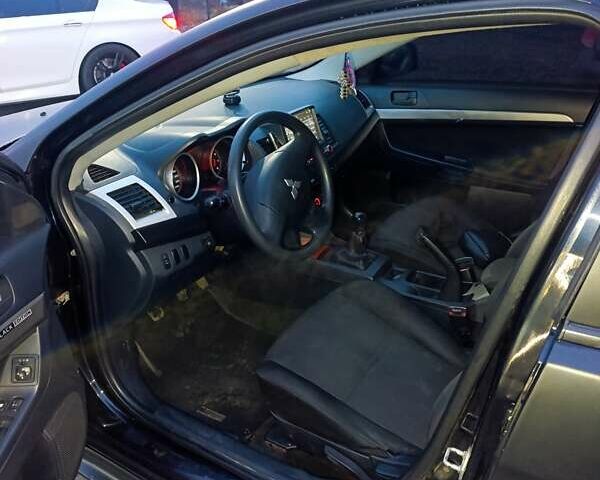 Чорний Міцубісі Lancer, об'ємом двигуна 1.5 л та пробігом 300 тис. км за 5500 $, фото 7 на Automoto.ua