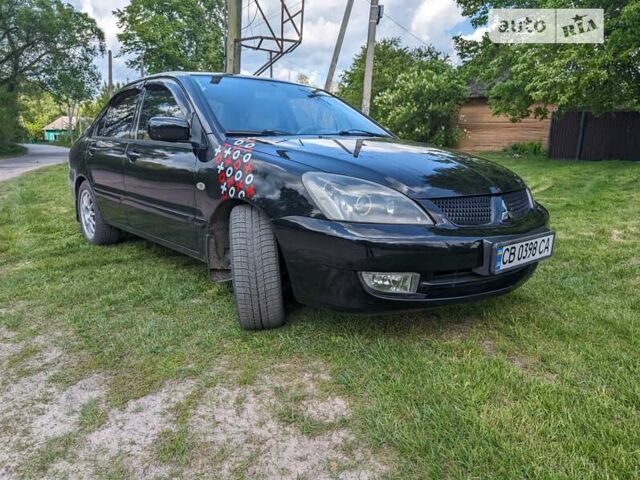 Чорний Міцубісі Lancer, об'ємом двигуна 1.6 л та пробігом 192 тис. км за 3850 $, фото 1 на Automoto.ua