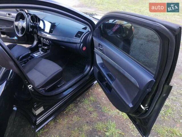 Мицубиси Лансер 2008 в Киеве на Automoto.ua Черный Мицубиси Лансер, объемом двигателя 2 л и пробегом 196 тыс. км за 5500 $, фото 22 на Automoto.ua