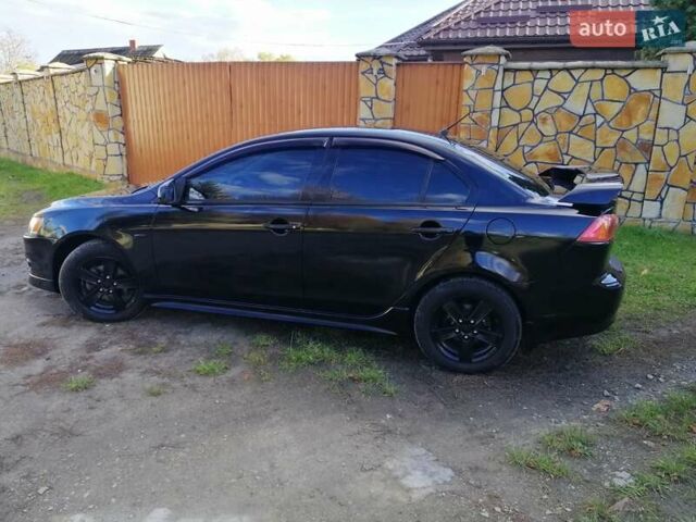 Мицубиси Лансер 2008 в Киеве на Automoto.ua Черный Мицубиси Лансер, объемом двигателя 2 л и пробегом 196 тыс. км за 5500 $, фото 6 на Automoto.ua