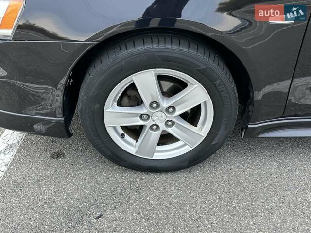 Чорний Міцубісі Lancer, об'ємом двигуна 2 л та пробігом 199 тис. км за 7900 $, фото 14 на Automoto.ua