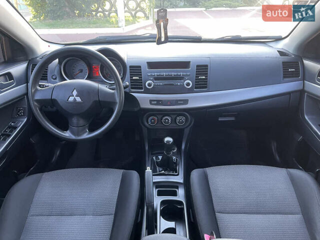 Черный Мицубиси Лансер, объемом двигателя 1.5 л и пробегом 263 тыс. км за 5300 $, фото 7 на Automoto.ua