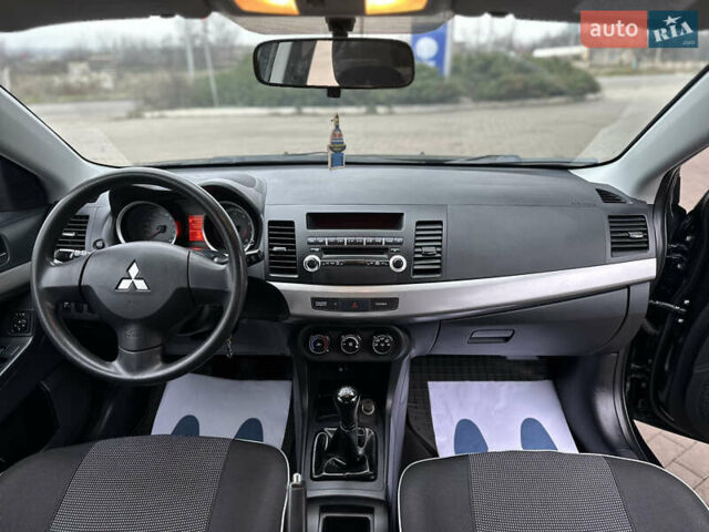 Чорний Міцубісі Lancer, об'ємом двигуна 1.5 л та пробігом 111 тис. км за 6999 $, фото 67 на Automoto.ua