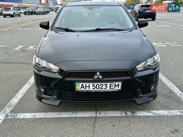 Чорний Міцубісі Lancer, об'ємом двигуна 2 л та пробігом 199 тис. км за 7900 $, фото 13 на Automoto.ua